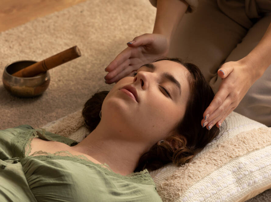 person-conducting-reiki-therapy